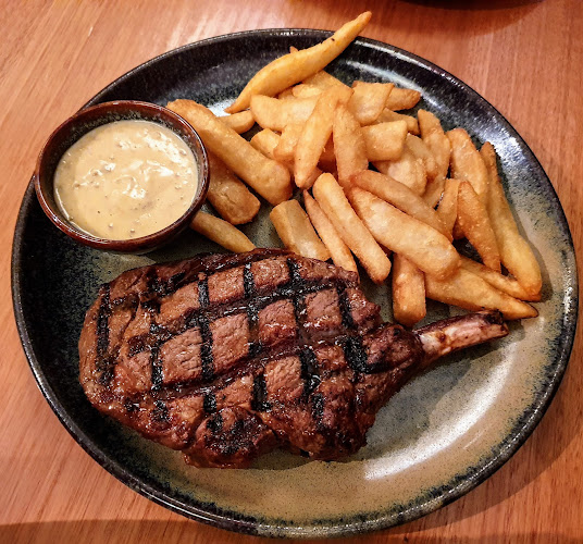 Rare Steakhouse Midtown - Hospitality and gastronomy