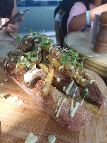 Opinii despre Le Jardin Cafe Restaurant în Main Beach - Hospitality and gastronomy