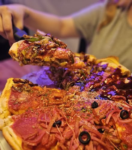 Remy's - Deep Dish Pizza & Bar