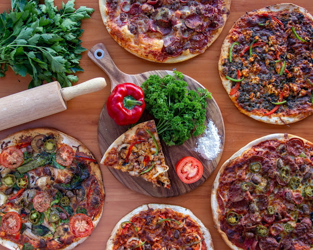 mamousheh pizza on crown - Hospitality and gastronomy